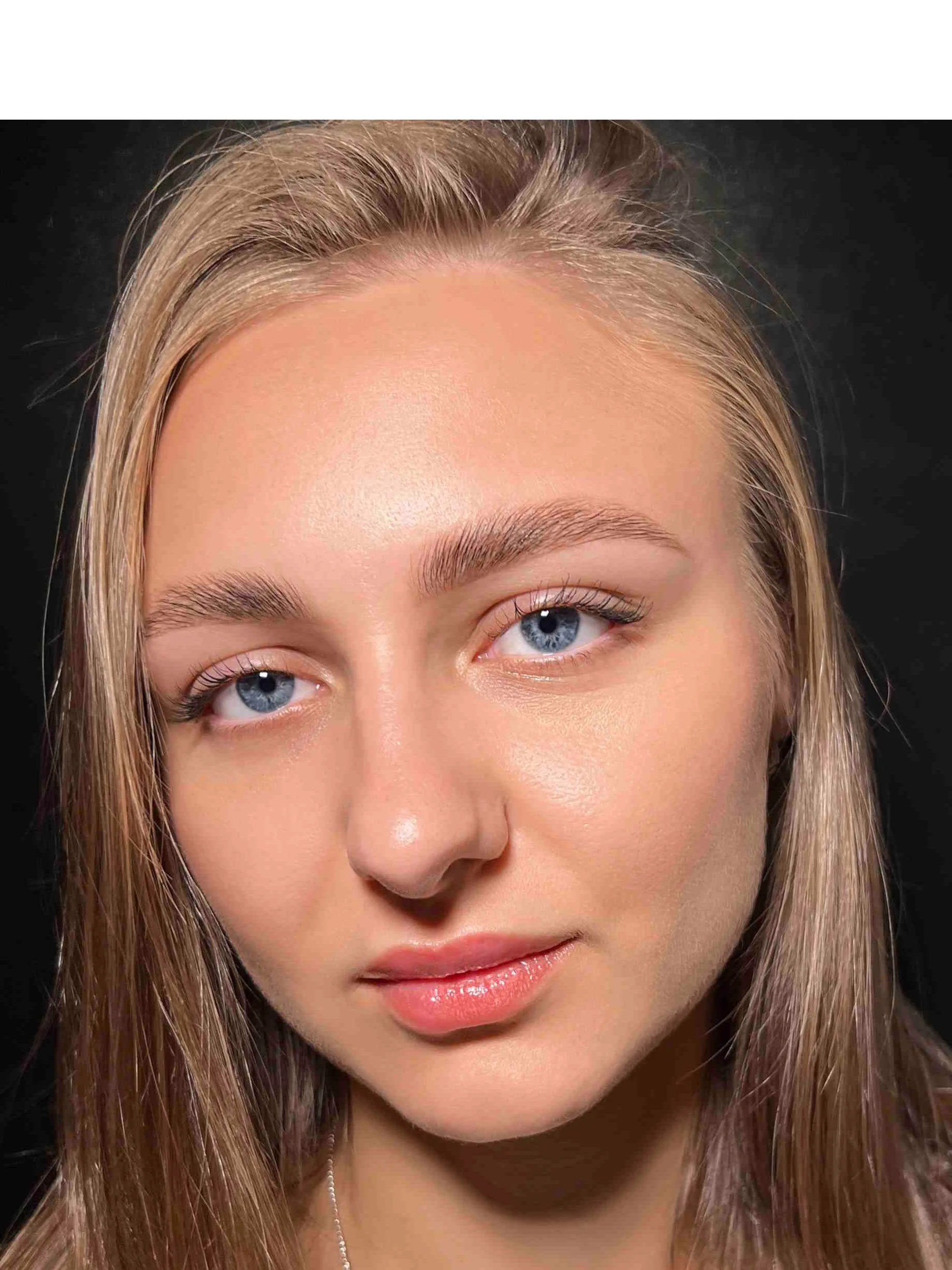Styled brow hairs after brow lamination by Elina