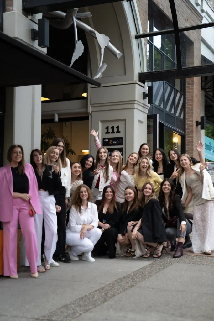 Elina with a group of beauty professionals at an industry gathering